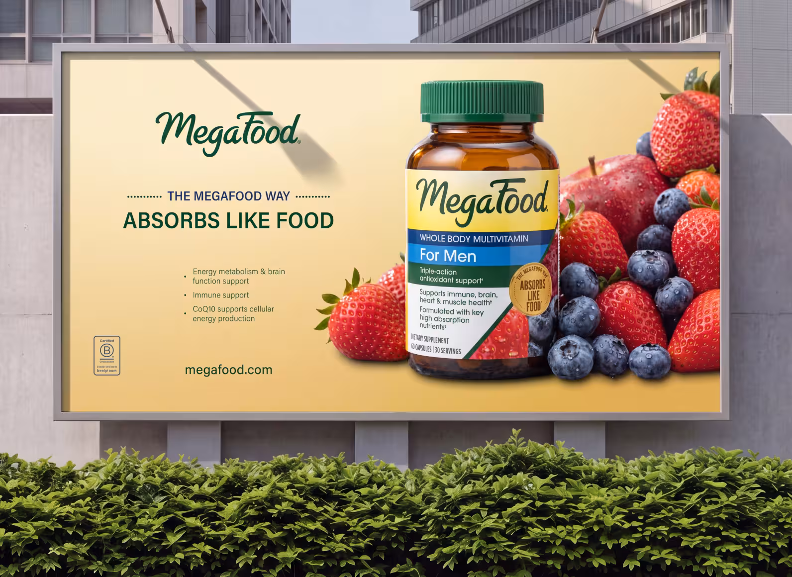 Billboard advertisement for MegaFood featuring a large bottle and berries, with the slogan 'Absorbs Like Food' and 'For Men'.