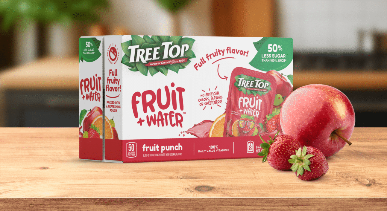 Tree Top Fruit + Water juice cartons on a wooden table with apples and strawberries nearby.